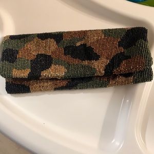 Cool beaded clutch bag. Fold over with zipper compartment. Worn once